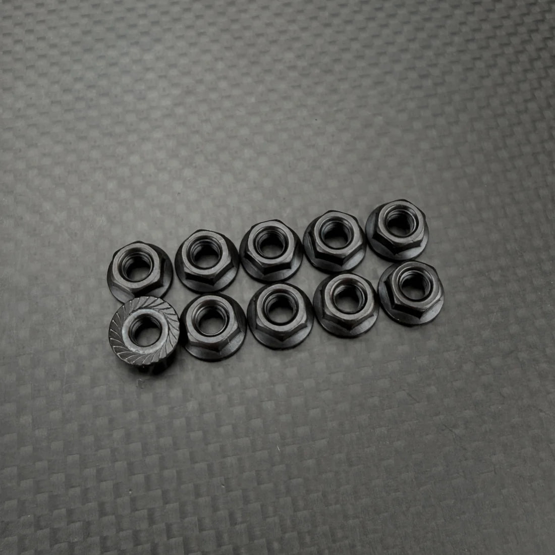 R1 WURKS – M4 FLANGED SERRATED BLACK NUTS – 10 PCS (R1B)